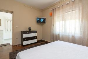 Postel nebo postele na pokoji v ubytování Apartman Verica