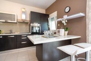 Kuchyň nebo kuchyňský kout v ubytování Apartman Verica