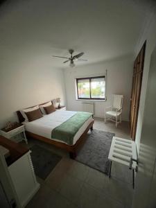 a bedroom with a large bed and a window at Cerva Village Apartment in Cerva +41 photos
