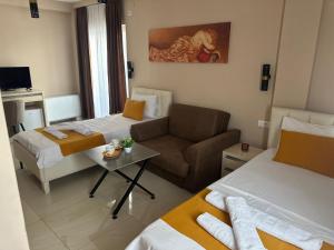 ASA Rooms tesisinde bir odada yatak veya yataklar