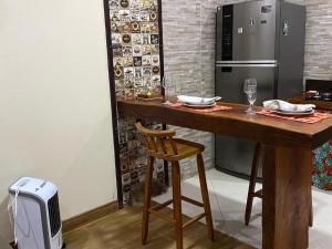 Kuchyň nebo kuchyňský kout v ubytování Chalé Beira Rio Cipó