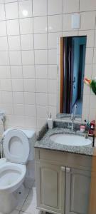 Ένα μπάνιο στο Apartamento aconchegante