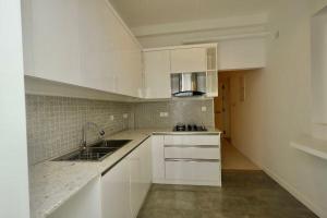 Kuchyň nebo kuchyňský kout v ubytování Pinewood Luxury apartment + 10 fotografií