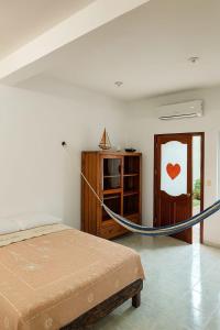 Ένα ή περισσότερα κρεβάτια σε δωμάτιο στο Casa Agave