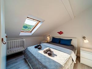 Giường trong phòng chung tại Holiday Home Island Gem - Five Bedroom Apartment