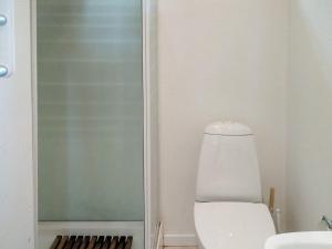 a bathroom with a toilet and a shower at 4 person holiday home in Silkeborg-By Traum in Silkeborg +19 photos