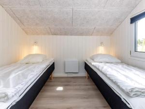 Postel nebo postele na pokoji v ubytování 10 person holiday home in Bindslev-By Traum + 25 fotografií