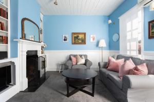 Гостиная зона в Alice's Cottages