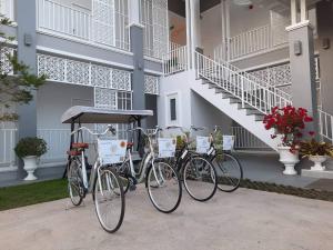 a group of bikes parked in front of a building at The Viera Chiangrai in Chiang Rai