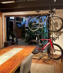 a bike is on a bike rack above a table at Suehiroya - Vacation STAY 60087v in Nakatsu +48 photos