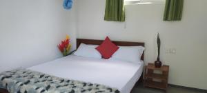 Postel nebo postele na pokoji v ubytování Sun Beach Villa
