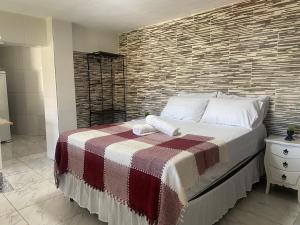 Postel nebo postele na pokoji v ubytování Loft Pescadores Vista Mar