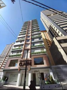 a tall building with balconies on the side of it at Confortable y lindo Departamento en la mejor Zona in La Paz