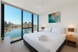 Ένα ή περισσότερα κρεβάτια σε δωμάτιο στο Aerie Stays NewQuay Collection +187 φωτογραφίες