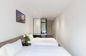 Katil atau katil-katil dalam bilik di Better Home Hanoi