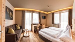 A bed or beds in a room at Autentis