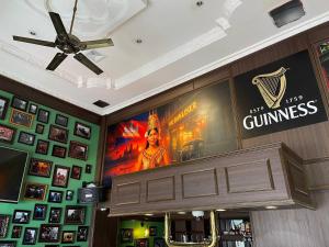 a large movie poster on the wall of a restaurant at The Dubliner Inn in Phnom Penh