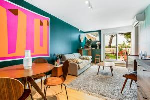 Et opholdsområde på Lovely terrace apartment in LGM