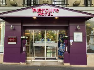 a store front with a sign that says don't drink at Mercure Paris Place d'Italie in Paris
