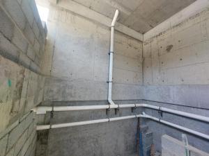 a room with pipes on the side of a wall at jeddah in Dubai