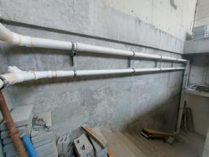 a room with pipes on the side of a wall at jeddah in Dubai