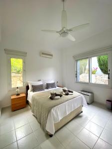 Katil atau katil-katil dalam bilik di STAY Helios House