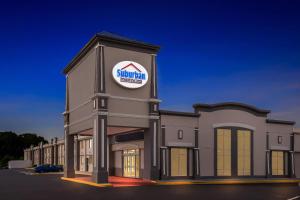 a building with a suntrust center sign on it at Suburban Studios Chester I-95 in Chester