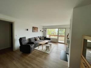 Χώρος καθιστικού στο Appartement spacieux idéalement situé