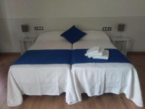 Łóżko lub łóżka w pokoju w obiekcie Pension Via-Stella