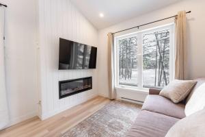 TV/trung tâm giải trí tại Condo and Spa - Le Saloon Nordik