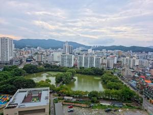 a city with a lake in the middle of a city at Icheon Hutis stay in Icheon