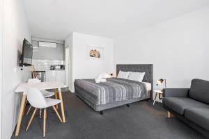Ένα ή περισσότερα κρεβάτια σε δωμάτιο στο Comfort Inn Commodore Albury