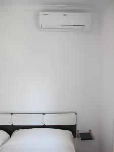 Posteľ alebo postele v izbe v ubytovaní Apartamentos Jimmy 2