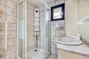 a bathroom with a shower and a sink at La Maréchale in Saint-Seurin-de-Cadourne +18 photos