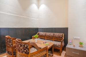a dining room with a table and chairs at Hotel Abhi international in Pathānkot