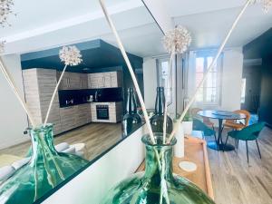Η κουζίνα ή μικρή κουζίνα στο Maison et Jardin Le 14 - Auxerre Centre - Wifi - Netflix - Confort et Détente