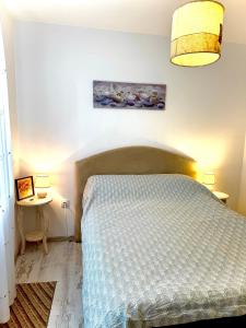 Ένα ή περισσότερα κρεβάτια σε δωμάτιο στο Selene Apartment