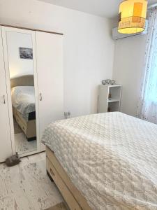 Ένα ή περισσότερα κρεβάτια σε δωμάτιο στο Selene Apartment