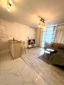 Μια τηλεόραση ή/και κέντρο ψυχαγωγίας στο Selene Apartment