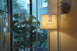 Et logo, certifikat, skilt eller en pris der bliver vist frem på Grand Hotel Terme & SPA - Chianciano