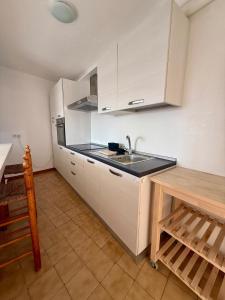 Kuchyň nebo kuchyňský kout v ubytování Estudio la santa azul