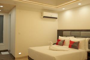 Postel nebo postele na pokoji v ubytování Parag Resort Kasauli