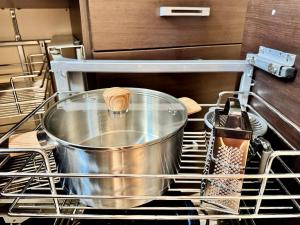 Η κουζίνα ή μικρή κουζίνα στο SunnyUrbanNest II