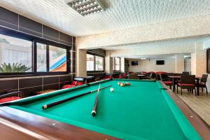 a billiard room with a pool table at Belport Beach Hotel in Beldibi