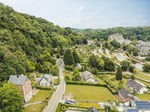 an aerial view of a small town with houses and a road at Villa Louise in Durbuy