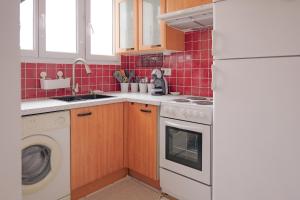 Kuchyň nebo kuchyňský kout v ubytování Joli appartement quartier de la madeleine - 4 personnes + 4 fotografie