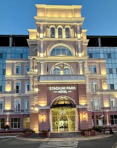 a building with a sign for the subway park hotel at Stadium Park Hotel in Odesa