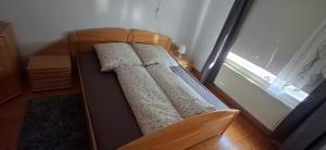 Кровать или кровати в номере Ferienhaus Meinheim