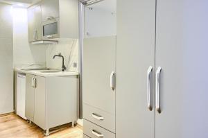 Η κουζίνα ή μικρή κουζίνα στο Vita Otel