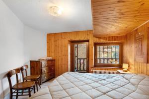 Ένα ή περισσότερα κρεβάτια σε δωμάτιο στο Maison Tillier Valtournenche